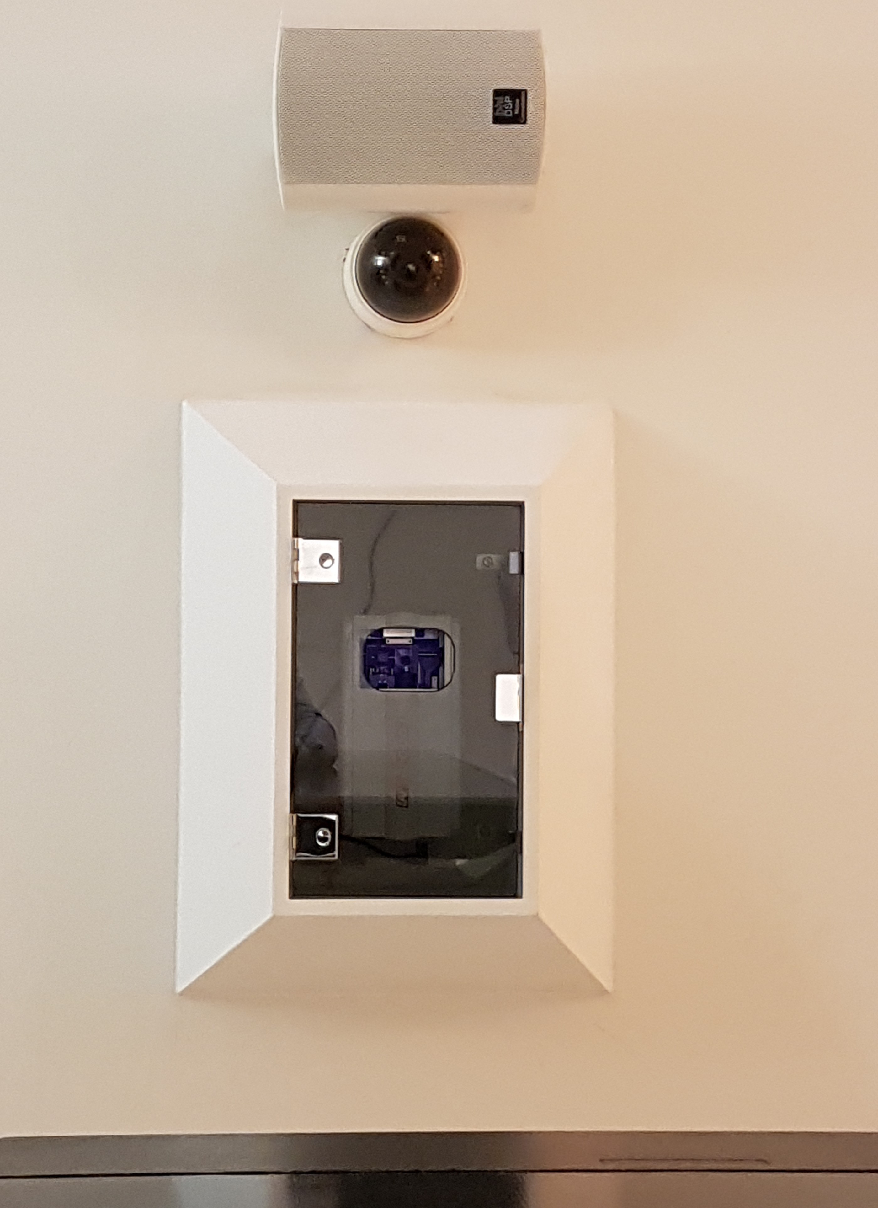Wall mounted intercom speaker in a hospital