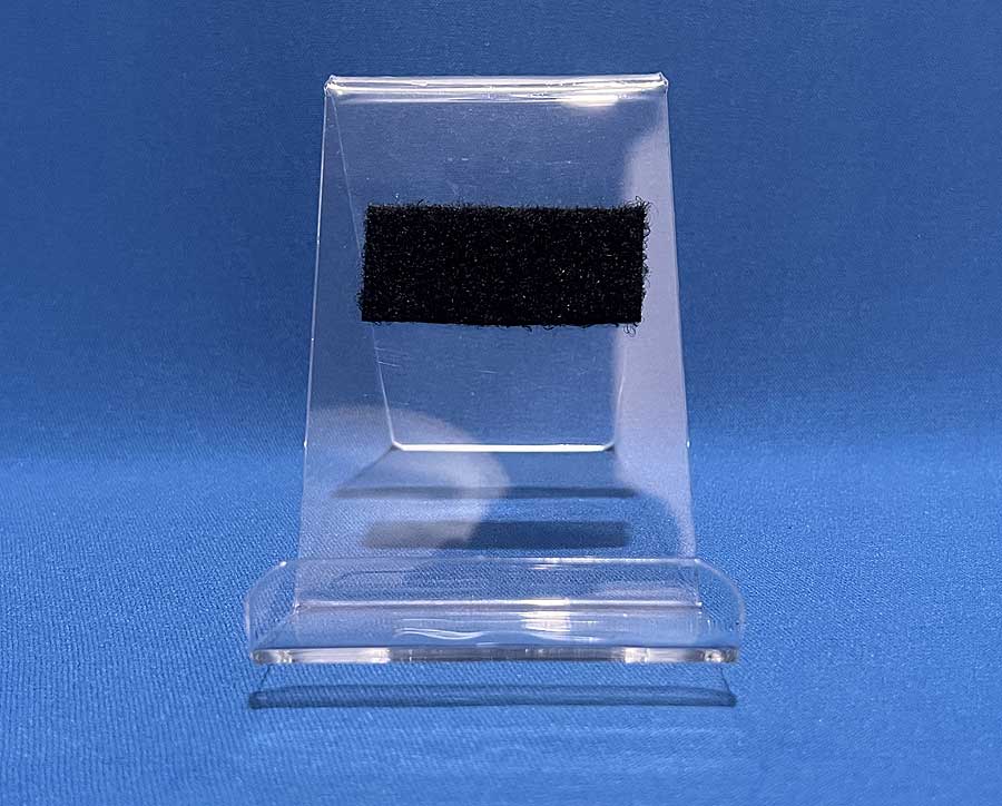 Acrylic mounting stand with a velcro strip