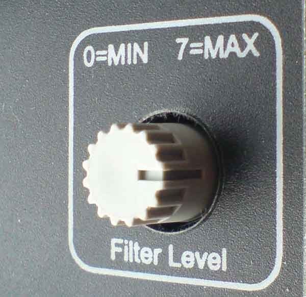 Grey rotary knob on a speaker